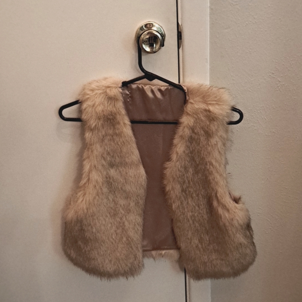 Tan fur vest with silk lining